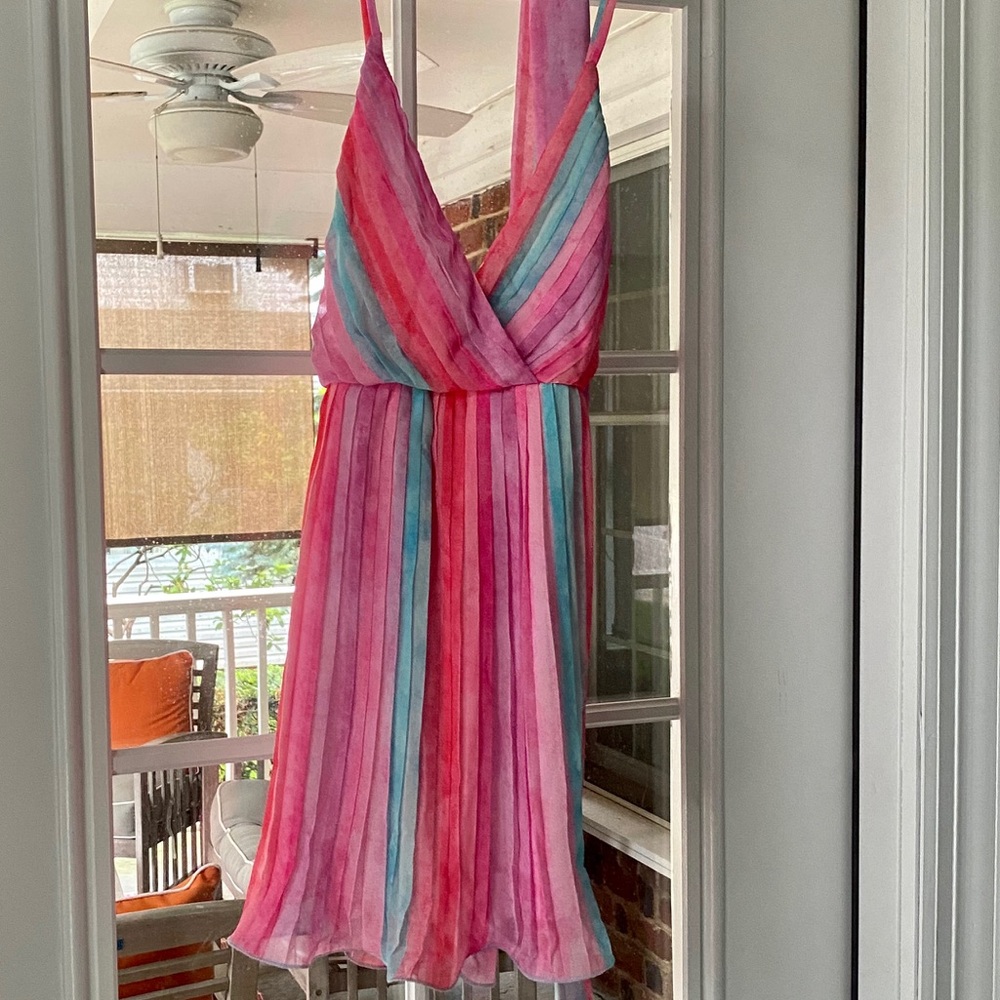 This is a beautiful mini dress and Never Worm